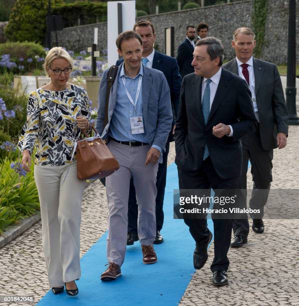 President Mario Draghi arrives accompanied by ECB Director General Communications Christine Graeff to deliver the opening speach at the first...