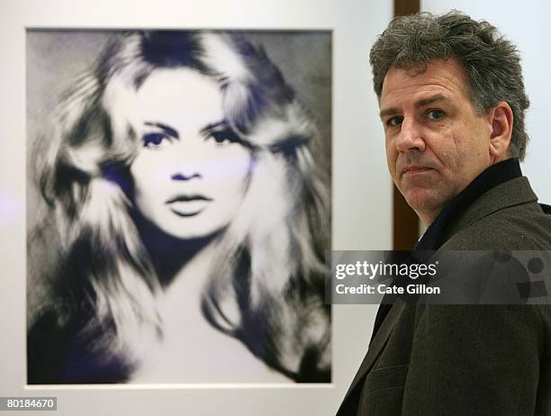 Gert Elfering stands beside 'Brigitte Bardot, Hair by Alexandre, January 1959' by Richard Avedon on March 10, 2008 in London, England. The Collection...