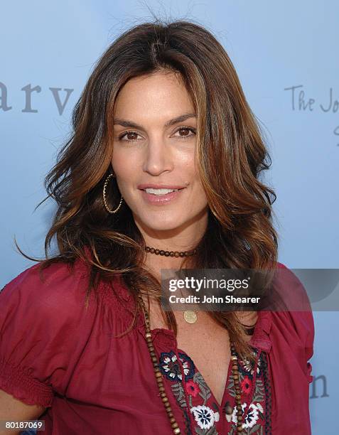 Model Cindy Crawford arrives to the John Varvatos 6th Annual Stuart House Benefit at the John Varvatos store on March 9, 2008 in West Hollywood,...