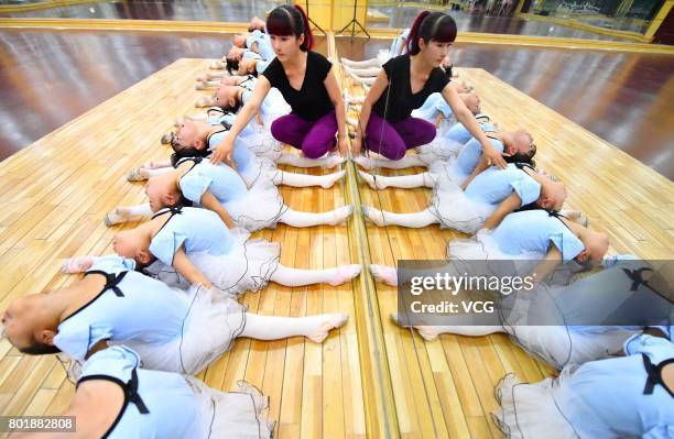 Children practice dance moves at a dance training centre on June 27, 2017 in Haozhou, Anhui Province of China. Under the guidance of professional...