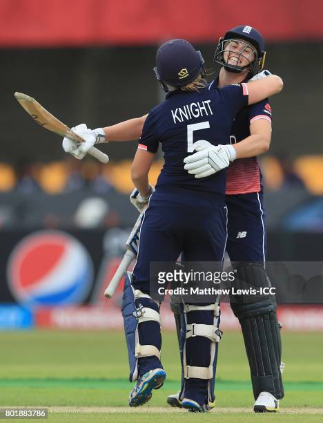 Heather Knight of England is congratulated on her century by Natalie Sciver during the ICC Women's World Cup 2017 match between England and Pakistan...