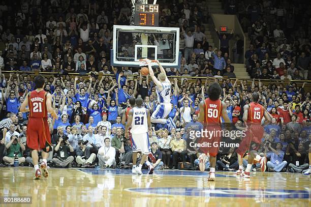 Kyle Singler of the Duke Blue Devils dunks the ball against the Maryland Terrapins at Cameron Indoor Stadium on February 13, 2008 in Durham, North...