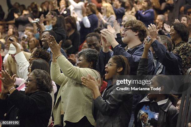 Supporters react to Democratic presidential hopeful Sen. Barack Obama as he speaks to a group gathered at Mississippi University for Women on March...
