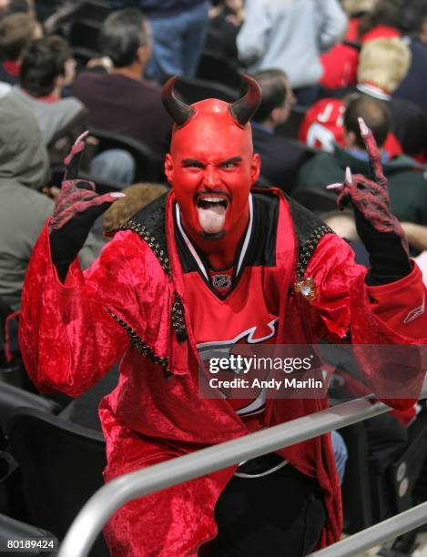 Fan of the New Jersey Devils poses for a photo during the game between the Tampa Bay Lightning and the New Jersey Devils at the Prudential Center on...