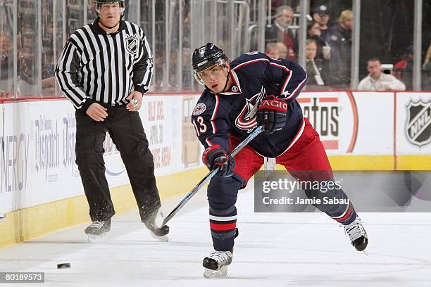 Nikolai Zherdev of the Columbus Blue Jackets shoots the puck up ice against the Edmonton Oilers on March 7, 2008 at Nationwide Arena in Columbus,...