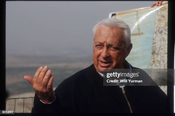 Israeli infrastructure minister Ariel Sharon gives a tour of the West Bank December 11, 1997 in Israel. Sharon took part in all of the Arab-Israeli...