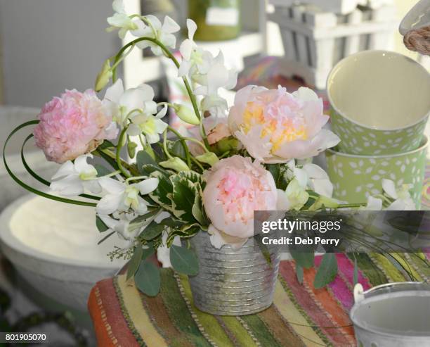floral arrangement of peonies and orchids - dendrobium orchid stock pictures, royalty-free photos & images