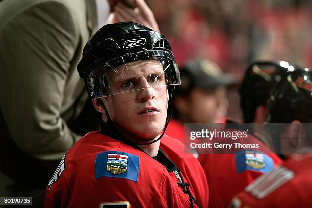 Dion Phaneuf of the Calgary Flames looks down the bench in between shifts against the Nashville Predators on March 7, 2008 at Pengrowth Saddledome in...