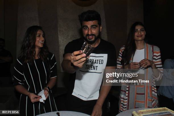 Bollywood actor Arjun Kapoor celebrates his birthday with his Mubarakan co-stars ILeana Dcruz, Athiya Shetty on June 25, 2017 in Mumbai, India.