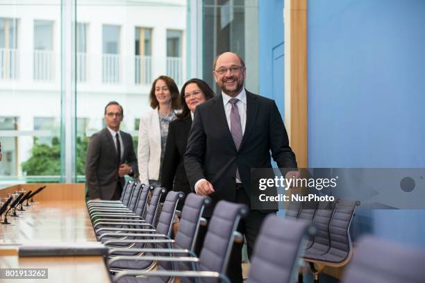 Chancellor candidate and chairman of Social Democratic Party Martin Schulz arrives at a news conference to illustrate the work of the party during...