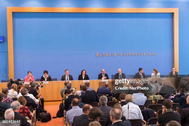 Chancellor candidate and chairman of Social Democratic Party Martin Schulz and SPD member of the government attend a news conference to illustrate...