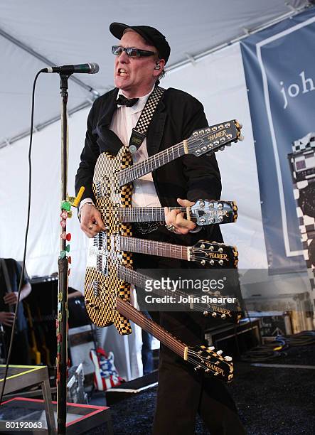 Guitarist Rick Nielsen of Cheap Trick performs at the John Varvatos 6th Annual Stuart House Benefit at the John Varvatos store on March 9, 2008 in...