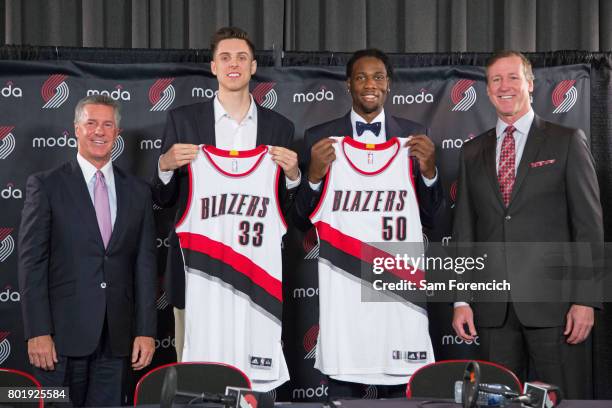 General Manager Neil Olshey and Head Coach Terry Stotts of the Portland Trail Blazers introduce Zach Collins and Caleb Swanigan to the media during a...