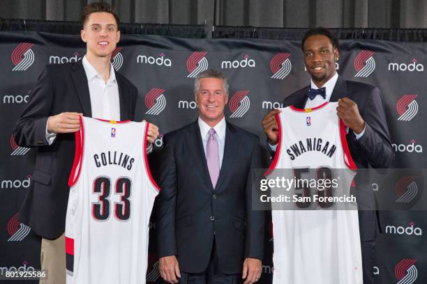 General Manager Neil Olshey of the Portland Trail Blazers introduces Zach Collins and Caleb Swanigan to the media during a press conference on June...