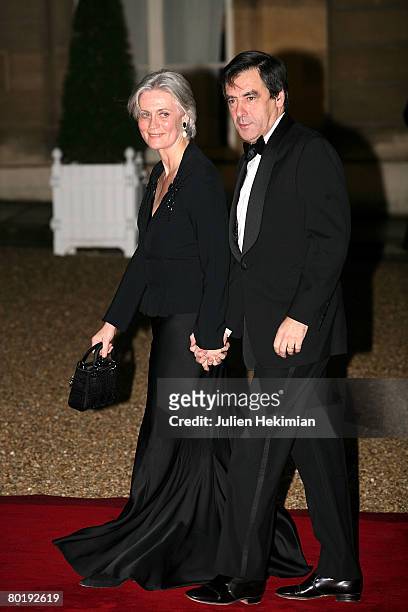 French Prime Minister Francois Fillon and his wife Penelope attend the state dinner in honor of Israeli President Shimon Perez at the Elysee Palace...