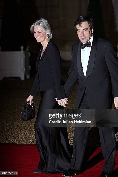 French Prime Minister Francois Fillon and his wife Penelope attend the state dinner in honor of Israeli President Shimon Perez at the Elysee Palace...