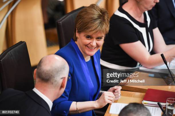 Scotland's First Minister Nicola Sturgeon, making an announcement to parliament regarding a second Scottish Independence Referendum on June 27,...