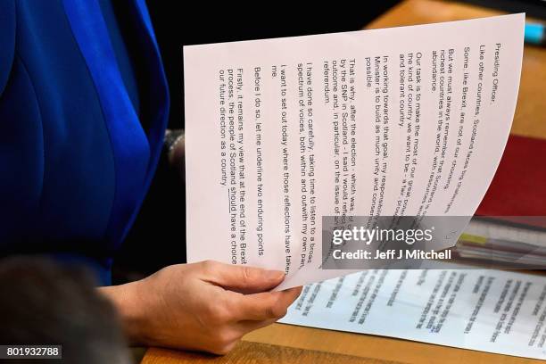 Scotland's First Minister Nicola Sturgeon, making an announcement to parliament regarding a second Scottish Independence Referendum on June 27,...