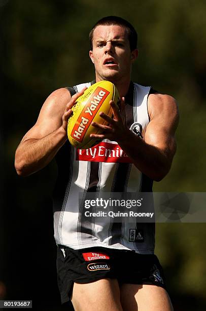 Nathan Brown of the Magpies marks during a Collingwood Magpies AFL training session at Gosch's Paddock on March 11, 2008 in Melbourne, Australia.