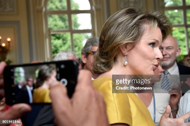 Queen Mathilde and King Philippe hosting a reception for the Mayors of Belgium at the Castle of Laeken.