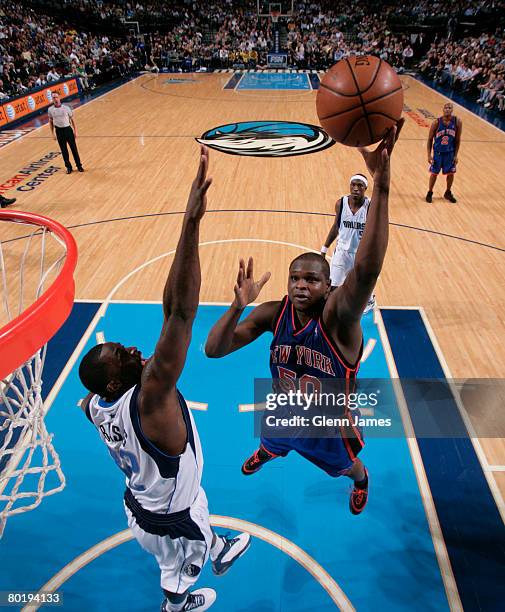 Zach Randolph of the New York Knicks goes up for the hook shot against Brandon Bass of the Dallas Mavericks at the American Airlines Center March 10,...