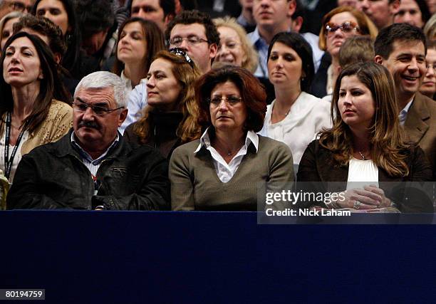 Roger Federer's father Robert, mother Lynettee and girlfriend Mirka Vavrinec watch as Pete Sampras and Federer play during their exhibition match on...