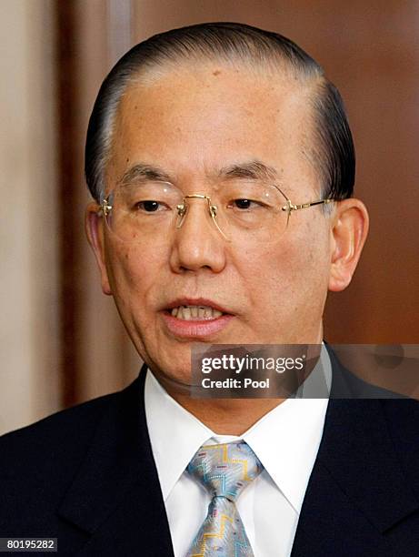 The nominee for governor of the Bank of Japan, Toshiro Muto delivers a speech during a hearings session at Lower House of the parliament March 11,...