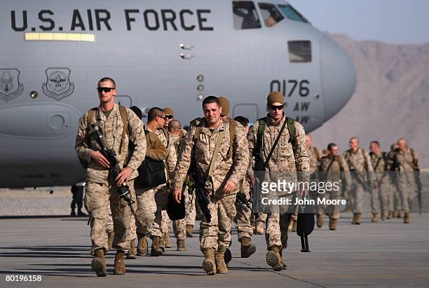 Combat forces from the 24th Marine Expeditionary Unit arrive March 11, 2008 to the Kandahar Air Field in southern Afghanistan. Regular Marine forces...