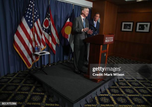 Gov. John Hickenlooper and Gov. John Kasich, participate in a bipartisan news conference to discuss the Senate health care reform bill at the...