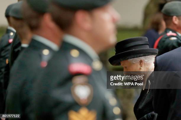 Queen Elizabeth II passes members of the Second Battalion, Princess Patricia's Canadian Light Infantry , known as "The Patricia's", as she arrives at...
