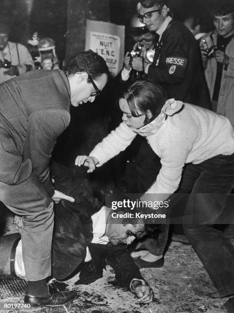 An injured man in the Latin Quarter during the student riots in Paris, 25th May 1968.