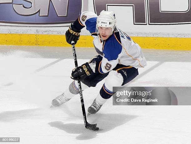 Paul Kariya of the St. Louis Blues skates stops with the puck during a NHL game against the Detroit Red Wings on March 5, 2008 at Joe Louis Arena in...