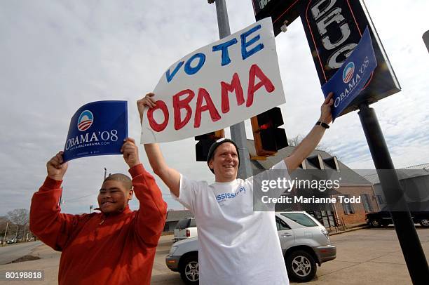 Vincent Kidd and Tim Quick support their favorite candidate in Meridian, Mississippi on Tuesday, March 11, 2008. Quick said that just before this...