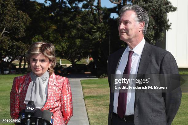 Attorney Gloria Allred and attorney John West, representing Judy Huth, speak during a trial setting conference of a civil suit against Bill Cosby at...