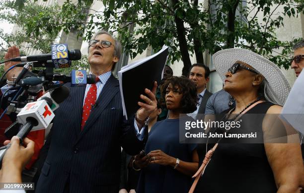Attorney Robert C. Gottlieb, Alfre Woodward and Maria Velazquez the mother of Jon Adrian Velazquez speak during a press conference for retrial motion...