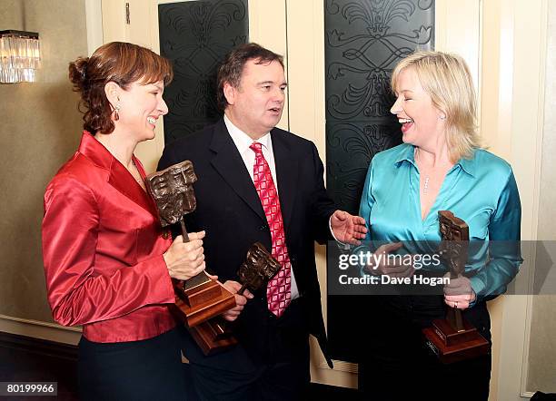 Fiona Bruce, Eamonn Holmes and Carol Kirkwood laugh in the awards room with their Newscaster/Reporter award sponsored by Cardiff Pinnacle,...