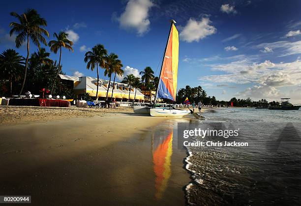 Catamaran with a colourful sail sits on the beach just outside St John's on March 10, 2008 in Dickenson Bay, Antigua.