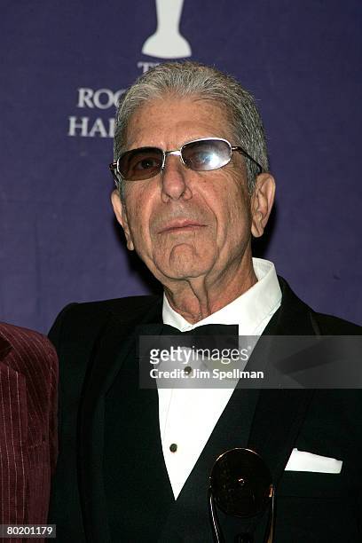 Honoree and musician Leonard Cohen poses in the press room during the 23rd Annual Rock and Roll Hall of Fame Induction Ceremony at the Waldorf...