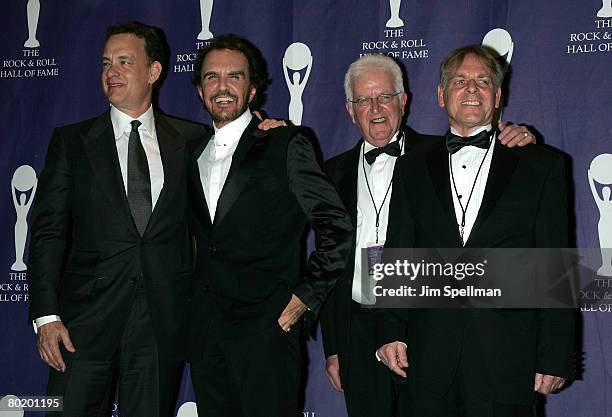 Inductee musicians of The Dave Clark Five and actor Tom Hanks poses in the press room during the 23rd Annual Rock and Roll Hall of Fame Induction...