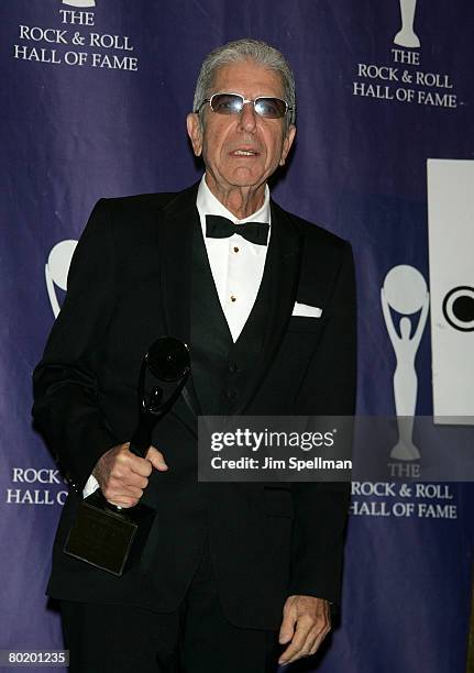 Honoree and singer Leonard Cohen poses in the press room during the 23rd Annual Rock and Roll Hall of Fame Induction Ceremony at the Waldorf Astoria...