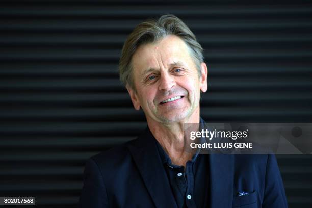 World-famous Latvian-born, Russian and US dancer, choreographer and actor Mikhail Baryshnikov smiles as he poses before a press conference during the...