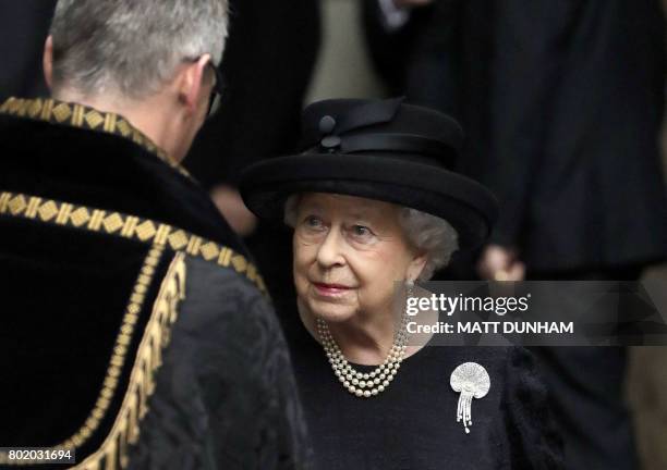 Britain's Queen Elizabeth II leaves after attending the funeral service of the 2nd Countess Mountbatten of Burma, Patricia Knatchbull at St Paul's...