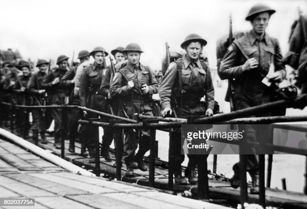 Picture released on June 5, 1944 of the British troops embarking at Southsea, Portsmouth in England, before a landing craft on June 6, 1944 while...