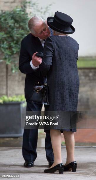 Prince Charles, Prince of Wales greets Queen Elizabeth II at the funeral service of Patricia Knatchbull, Countess Mountbatten of Burma at St Paul's...