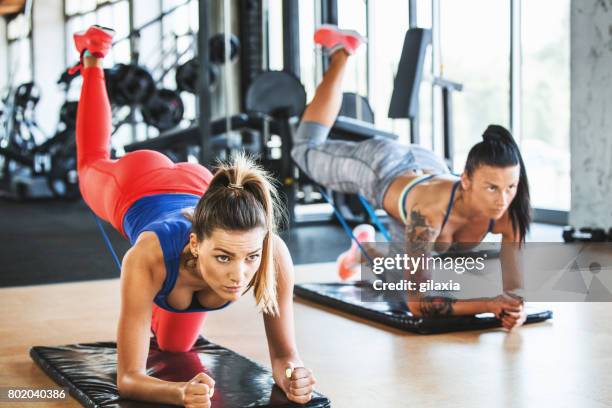 glute kickbacks. - bottom stock pictures, royalty-free photos & images