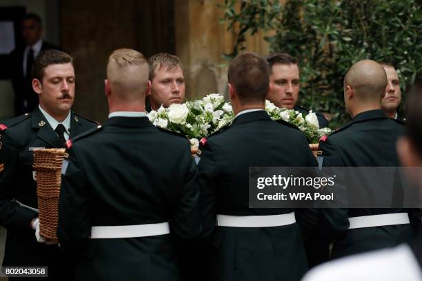 Pallbearers from the Second Battalion, Princess Patricia's Canadian Light Infantry , known as "The Patricia's", carry the coffin of Patricia...