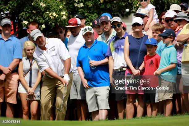 June 25: Boo Weekley chips onto the green on the fifth during the fourth round of the Travelers Championship Tournament at the TPC River Highlands...