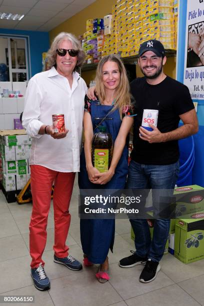 José Mercé, Emiliano Suárez and Carola Baleztena pay a visit to the food bank of Messengers of Peace in Madrid. Spain. June 27, 2017