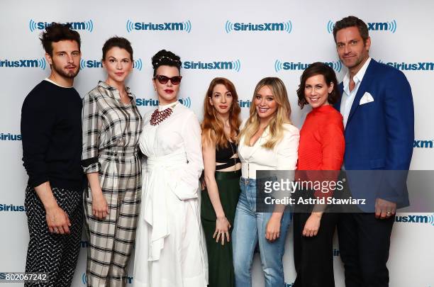 Actors Nico Tortorella, Sutton Foster, Debi Mazar, Molly Bernard, Hilary Duff, Miriam Shor and Peter Hermann from the cast of YOUNGER pose for photos...