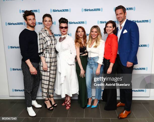 Actors Nico Tortorella, Sutton Foster, Debi Mazar, Molly Bernard, Hilary Duff, Miriam Shor and Peter Hermann from the cast of YOUNGER pose for photos...